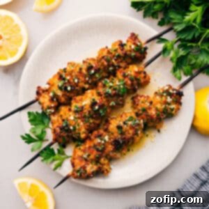 Perfectly baked Chicken Spiedini skewers, golden brown and crispy.