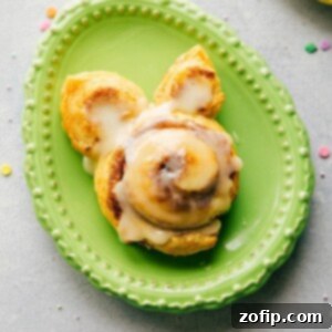 4 Easy Easter Treats 5 Easter Bunny Cinnamon Rolls, baked and frosted, ready for a festive breakfast.