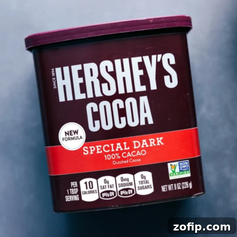 Essential Special Dark Cocoa Powder for Chocolate Peanut Butter Overnight Oats A container of special dark cocoa powder, the key ingredient used in this breakfast recipe, highlighted for its rich flavor.