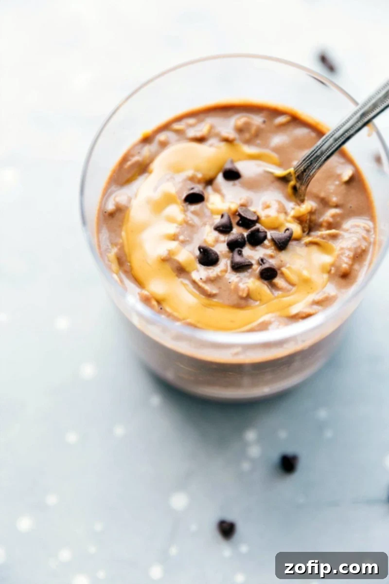 Delicious Chocolate Peanut Butter Overnight Oats - Ready to Enjoy A cup filled with the delicious and sweet chocolate peanut butter overnight oats breakfast, ready to be enjoyed.