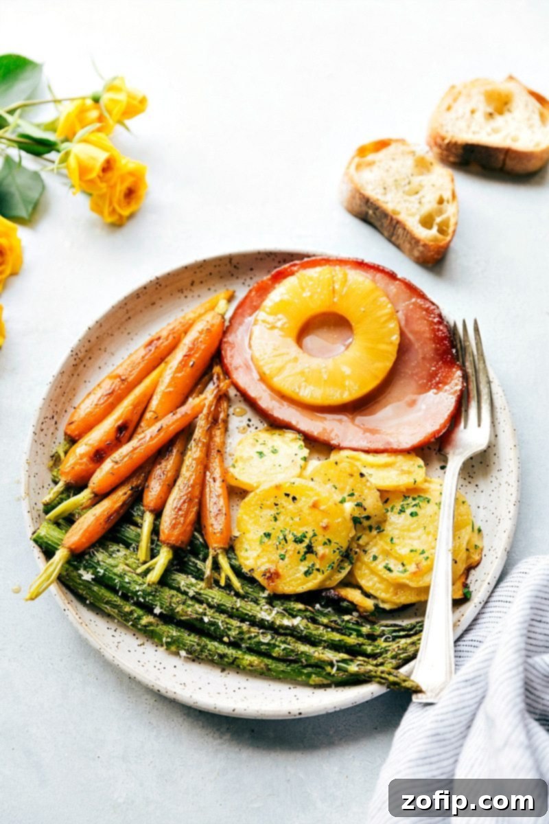 Your complete Easter dinner, beautifully plated and ready to be enjoyed with family and friends. A beautifully plated Easter dinner, showcasing all the delicious components: ham, potatoes, carrots, and asparagus, with a fork ready to dig in.