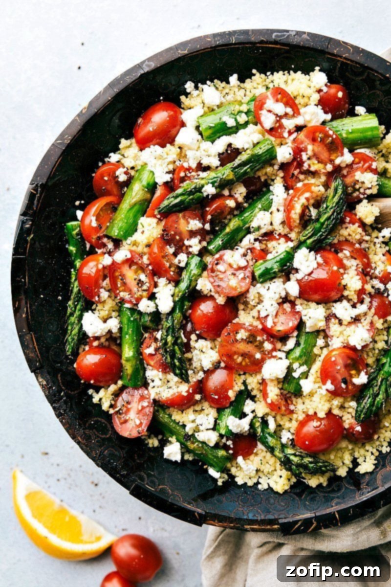 Close-up of the finished Asparagus Salad, showing texture and vibrant ingredients.