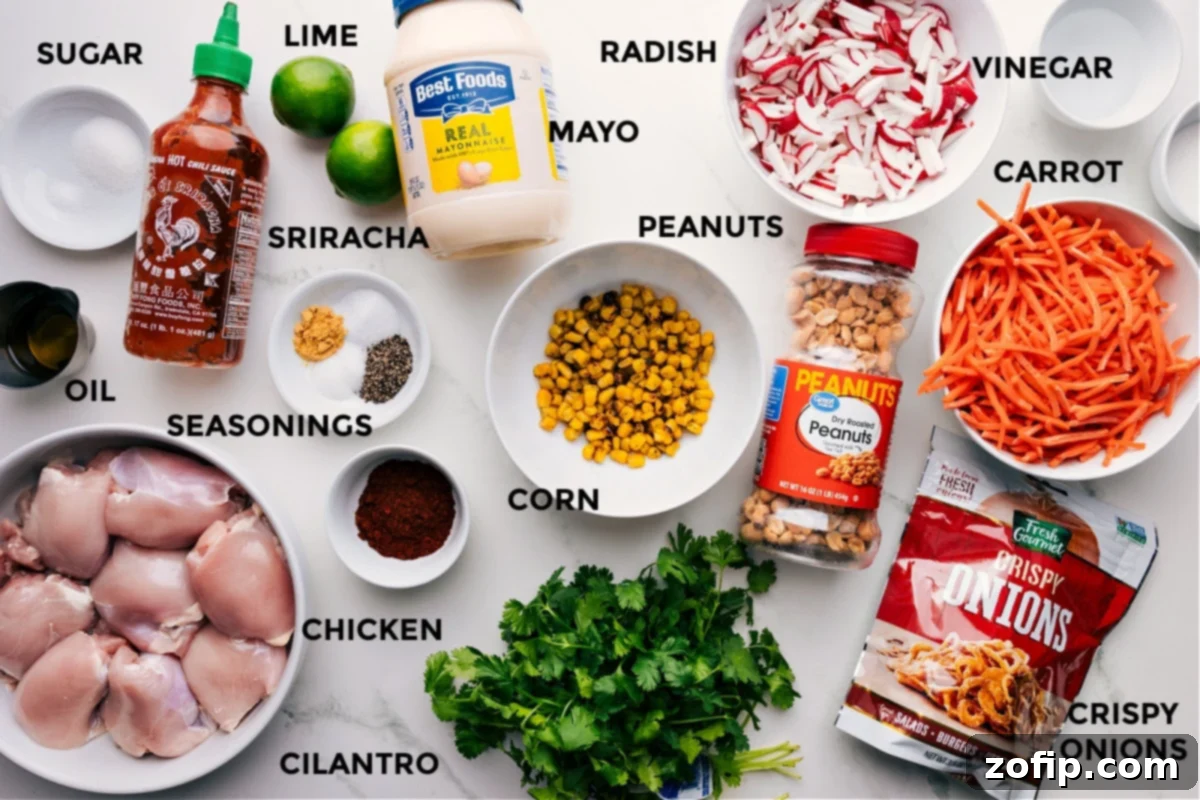 All ingredients prepped for easy assembly: sugar, sriracha, lime, mayo, radish, vinegar, carrot, peanuts, corn, seasonings, oil, meat, cilantro, and crispy onions for Asian Chicken Bowls.