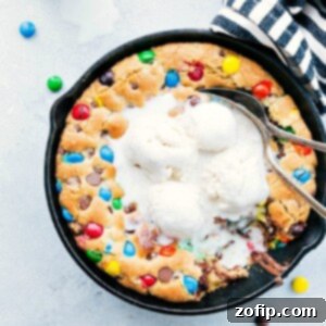 Warm Skillet Cookie Perfection 4 Freshly baked, warm pizookie topped with melting vanilla ice cream and hot fudge.