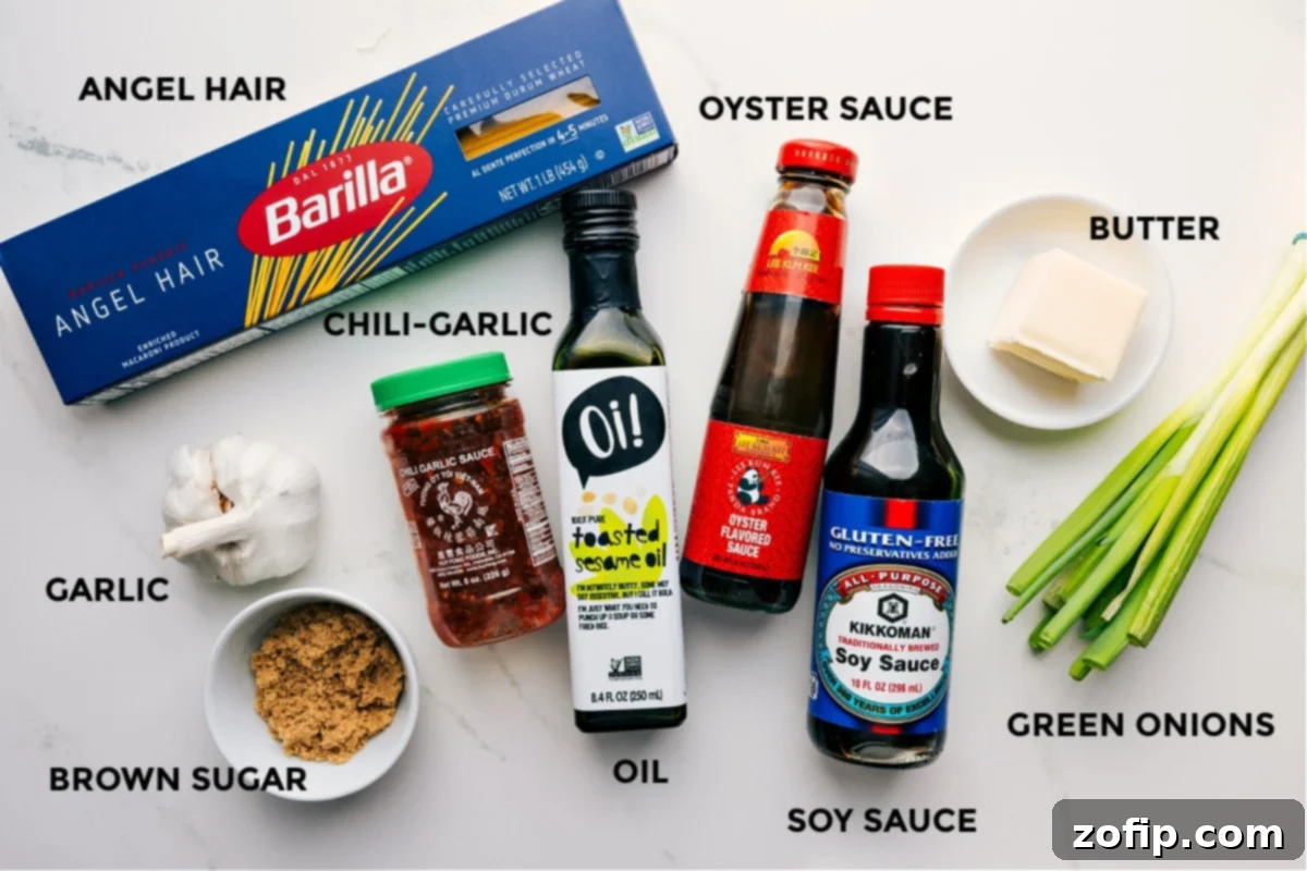 All the ingredients for Chili Garlic Noodles prepped and ready, including angel hair pasta, oyster sauce, butter, green onions, soy sauce, oil, chili garlic sauce, garlic, and brown sugar.