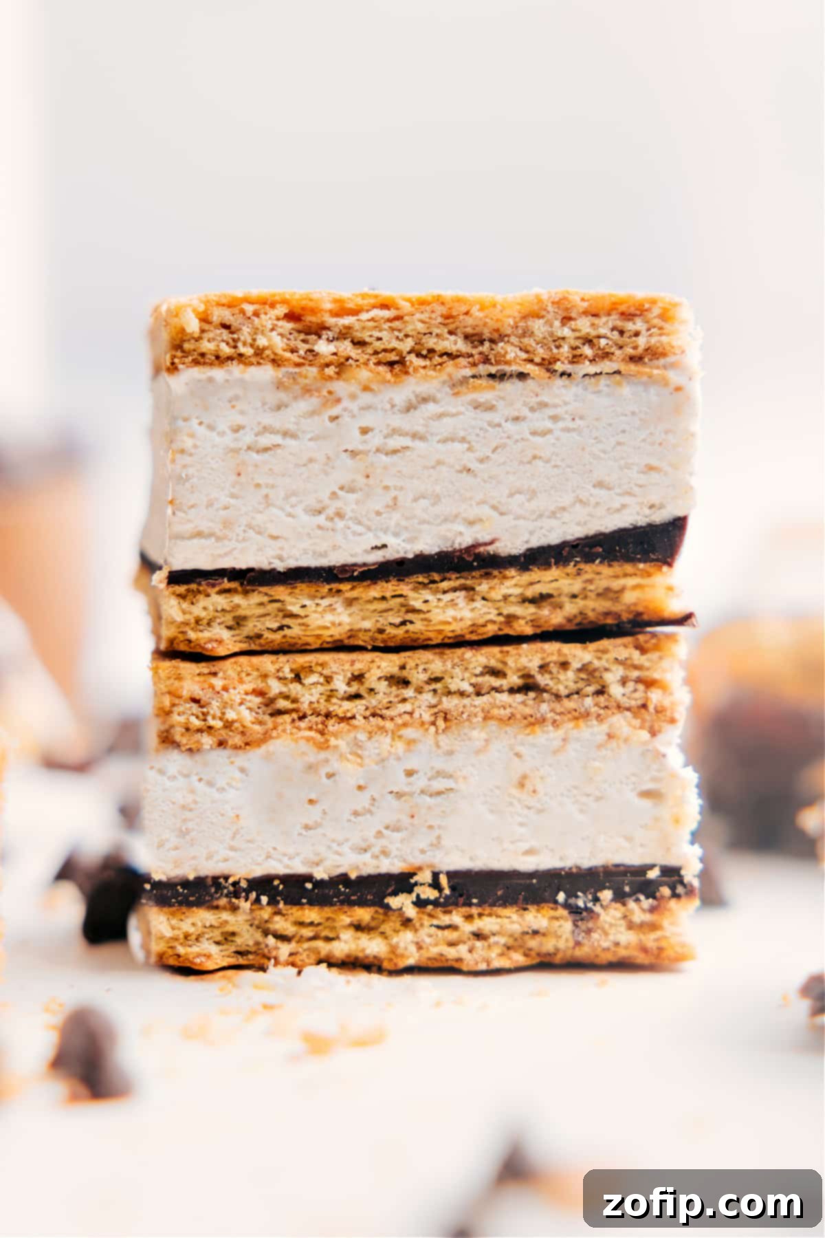 Frozen Protein S’mores stacked in a neat pile, showcasing the creamy protein center, rich chocolate layers, and crisp graham crackers, ready to be enjoyed as a refreshing treat.