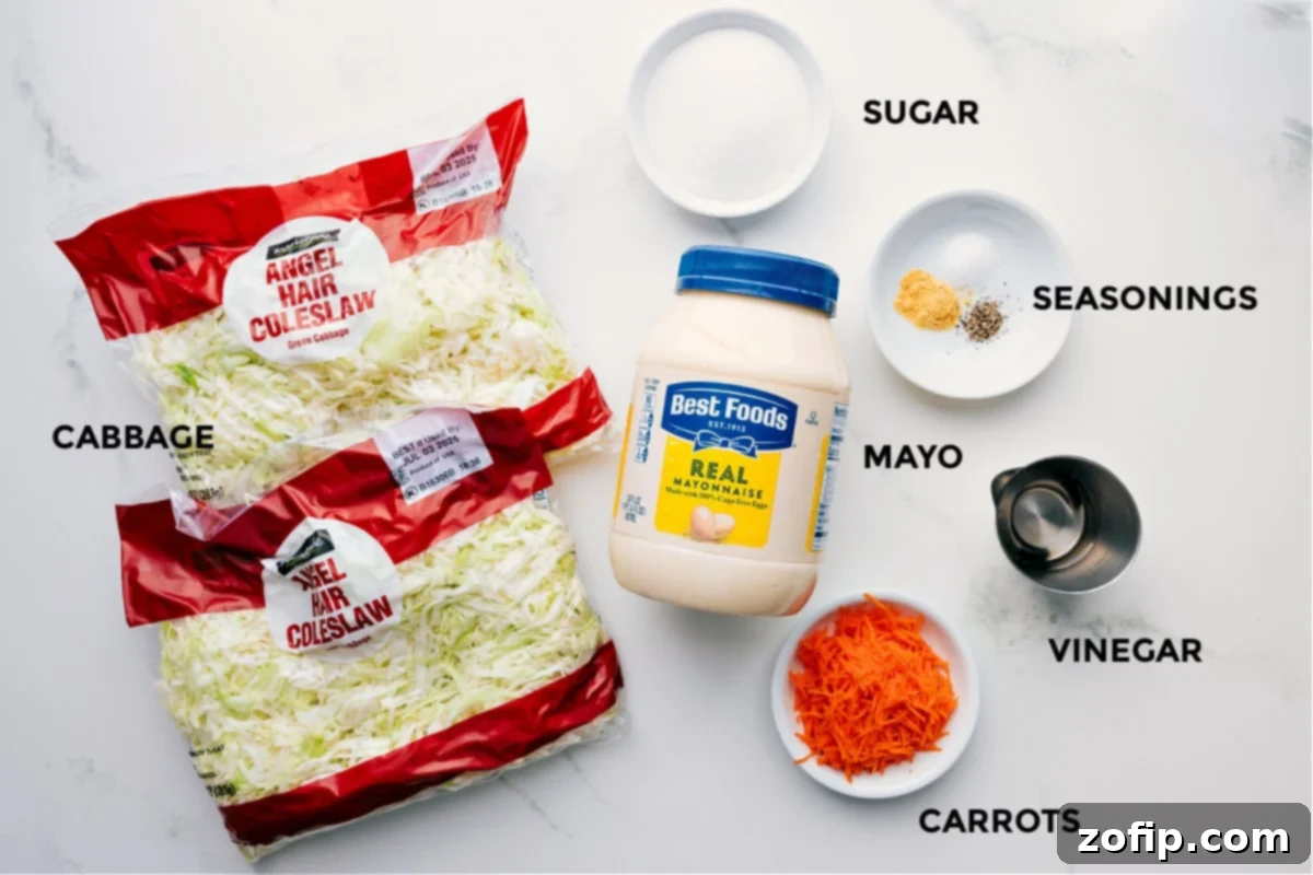 All ingredients prepped and laid out for the Chick-Fil-A Coleslaw recipe, including angel hair coleslaw, mayonnaise, sugar, seasonings, carrots, and white vinegar.