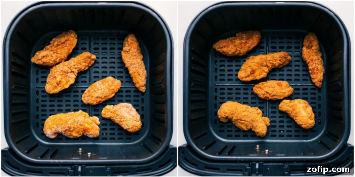 Chicken tenders being air-fried to a golden, crispy perfection, ready to be coated in the hot honey sauce for sliders.