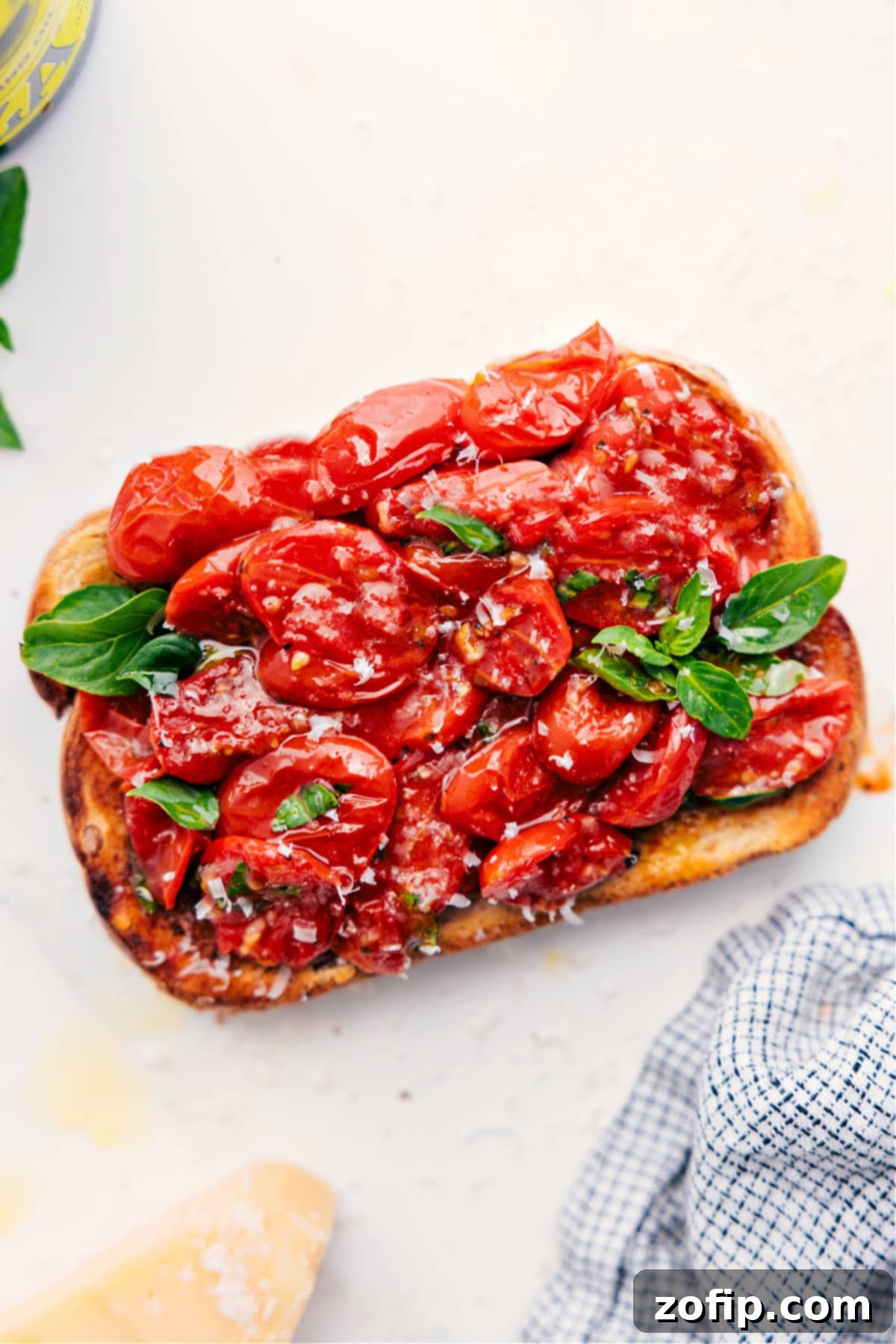 The Best Way To Enjoy Roasted Cherry Tomatoes Delicious roasted cherry tomatoes piled high on toasted bread for a yummy bruschetta-inspired snack or light meal.