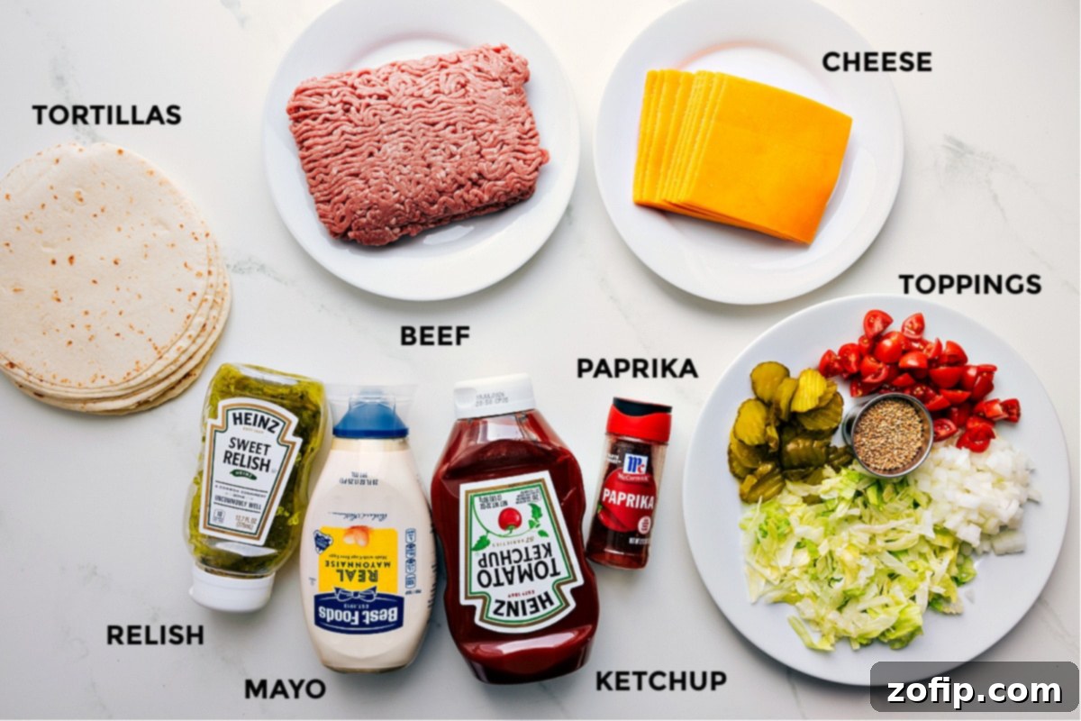 All the ingredients are prepped and ready for easy assembly. That includes the tortillas, beef, cheese, relish, mayo, ketchup, paprika, and toppings.