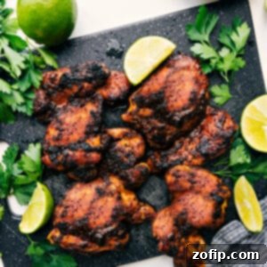 A delicious plate of baked boneless chicken thighs.