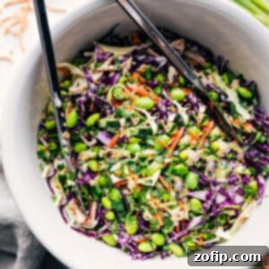 Vibrant Asian Slaw 3 Delicious and vibrant Asian Slaw in a serving bowl, perfectly dressed and garnished.