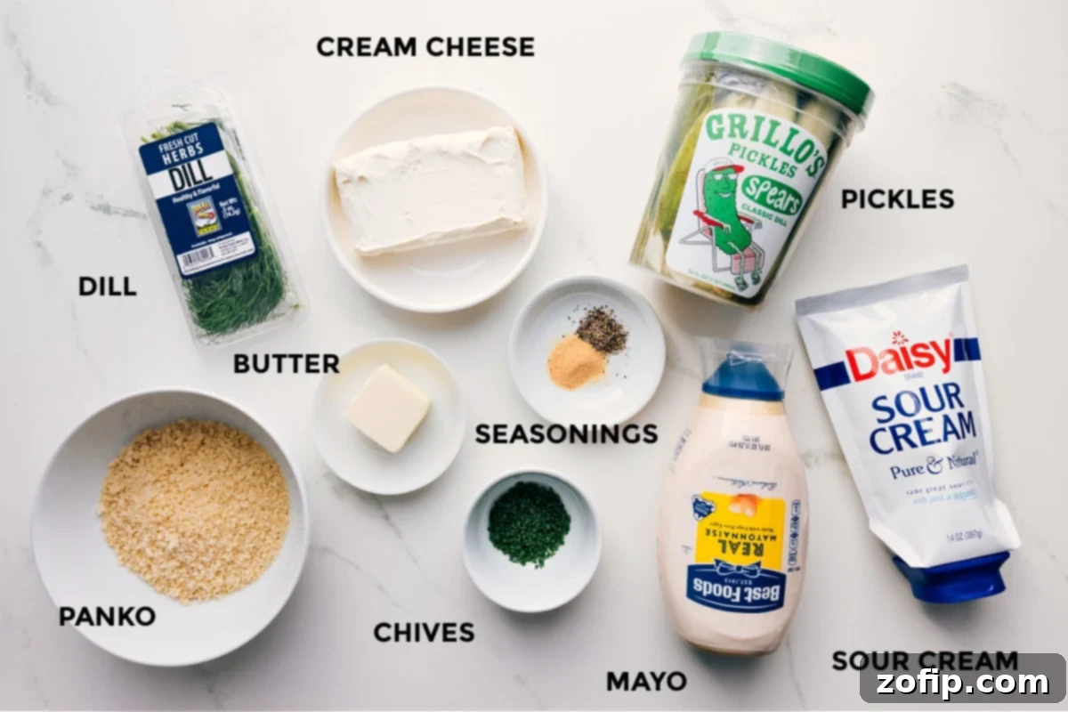 All ingredients prepped for easy assembly: dill, cream cheese, panko, butter, seasonings, chives, mayo, sour cream, and pickles.