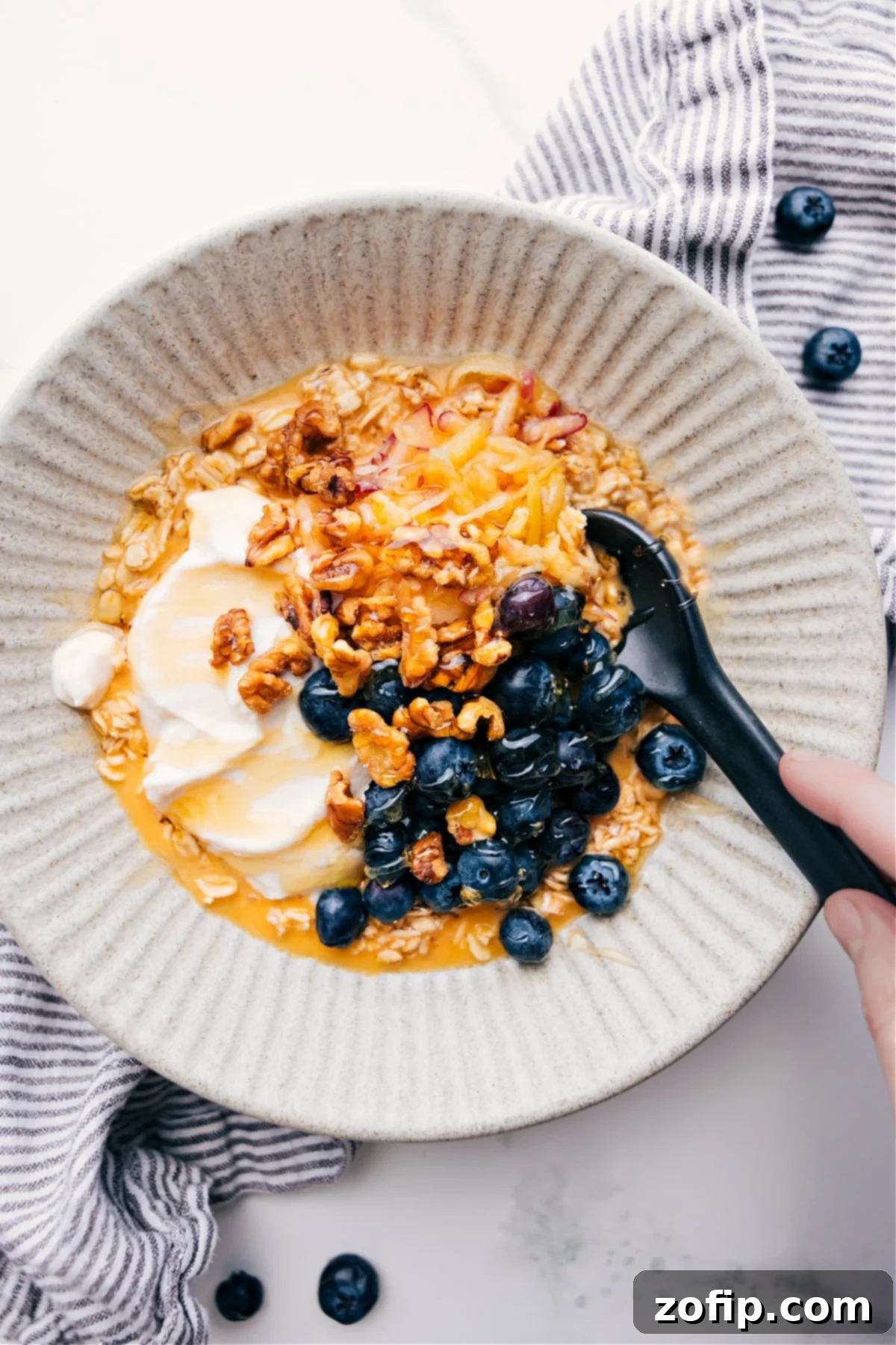 Quick And Delicious Princess Diana's Breakfast Princess Diana's Breakfast in a bowl with blueberries, walnuts, and yogurt on top, ready to enjoy.