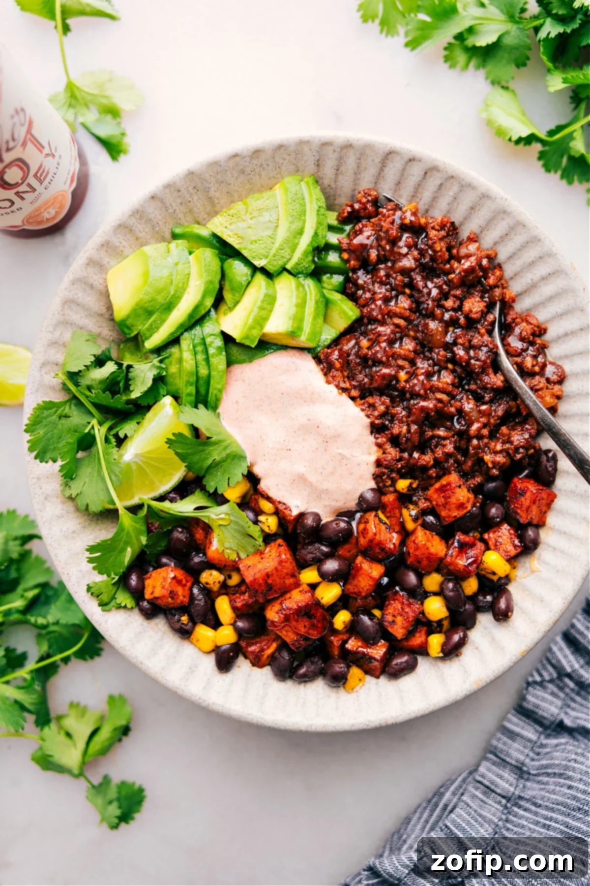 High-protein Trader Joe's cottage cheese ground beef bowls with sweet potato and avocado.