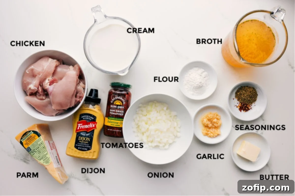 Ingredients In Crockpot Marry Me Chicken Recipe All the essential ingredients prepped for Crockpot Marry Me Chicken, including chicken, Parmesan cheese, Dijon mustard, heavy cream, sun-dried tomatoes, onion, flour, garlic, seasonings, butter, and chicken broth.