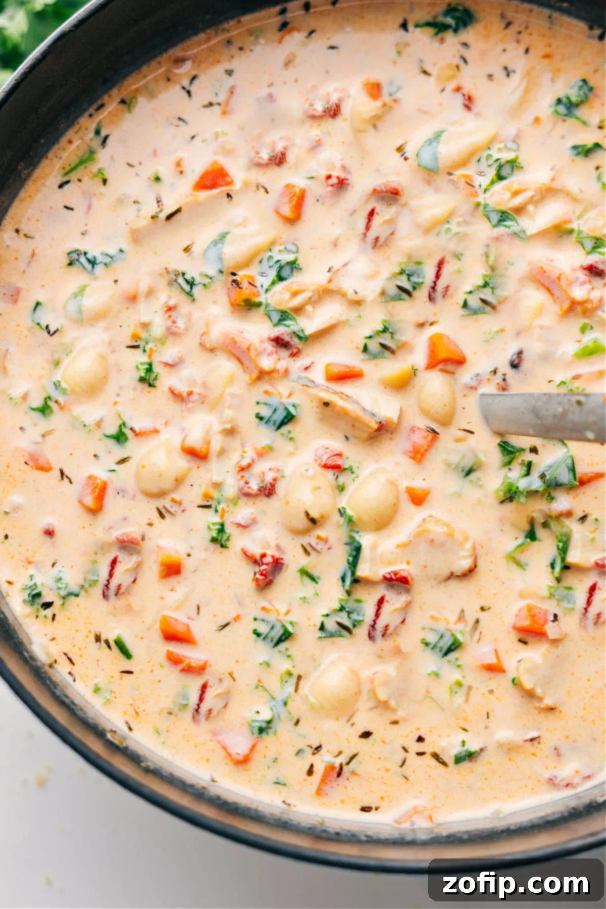 Marry Me Chicken Soup: The Ultimate Weeknight Comfort Food A large pot filled with creamy Marry Me Chicken Soup, ready to be served, highlighting its rich texture and a hint of fresh kale and sun-dried tomatoes.
