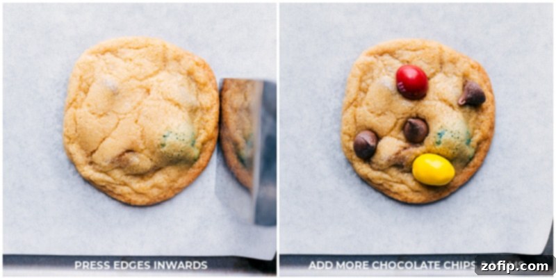Process shots demonstrating how to gently push the edges of baked cookies inwards for a perfectly round shape, and then adding extra chocolate chips and M&M's on top for aesthetic appeal.