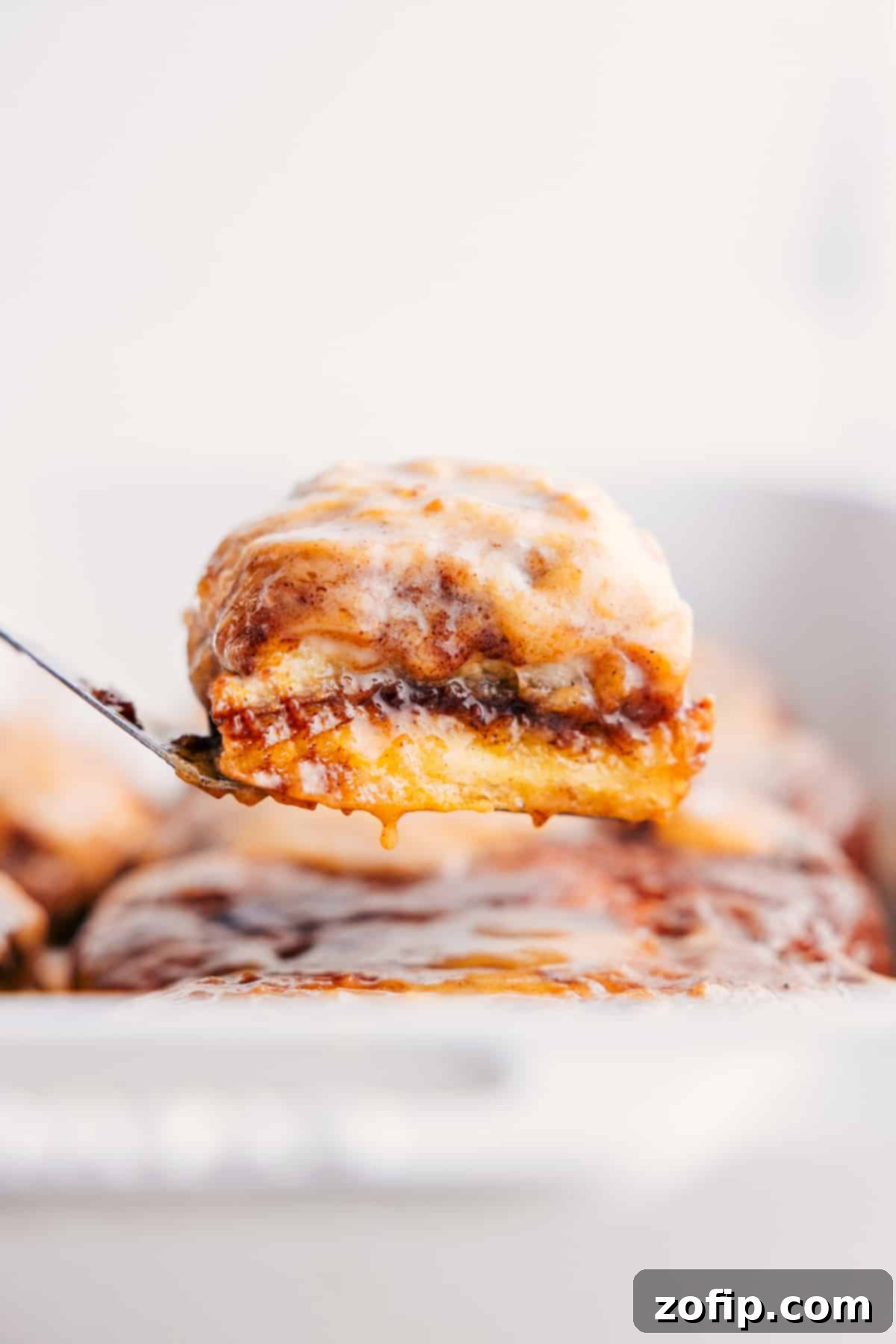 Quick & Easy Magic Pumpkin Cinnamon Rolls (No Kneading!) Warm, gooey Magic Pumpkin Cinnamon Rolls fresh from the oven, generously drizzled with a rich cream cheese glaze, inviting you to enjoy a perfect fall treat.