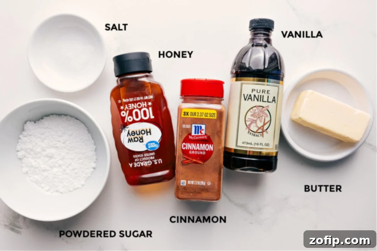 All the essential ingredients for making this delicious Honey Butter Recipe are neatly prepped and laid out on a clean surface, including softened unsalted butter, fine powdered sugar, rich honey, pure vanilla extract, fragrant ground cinnamon, and a pinch of salt.