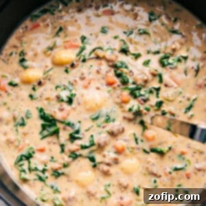 Close-up of a rustic bowl filled with creamy Sausage Gnocchi Soup, showcasing the tender gnocchi and savory sausage.