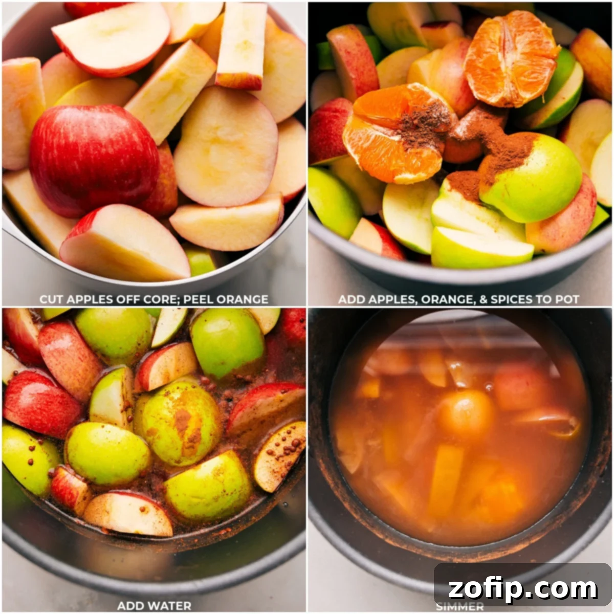 Freshly cut apples and an orange, along with whole spices, simmering in a large pot on the stovetop, preparing to infuse their flavors into hot apple cider.