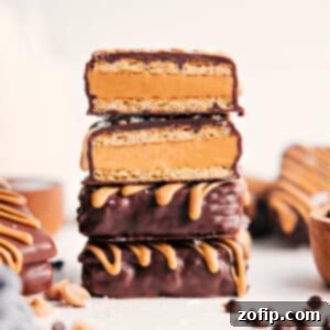 Close-up of a stack of Buckeye Graham Crackers showing the luscious peanut butter filling and chocolate coating.
