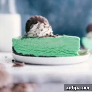 Decadent Mint Chocolate Cheesecake 3 Thin mint cheesecake topped with whipped cream and a cookie garnish.
