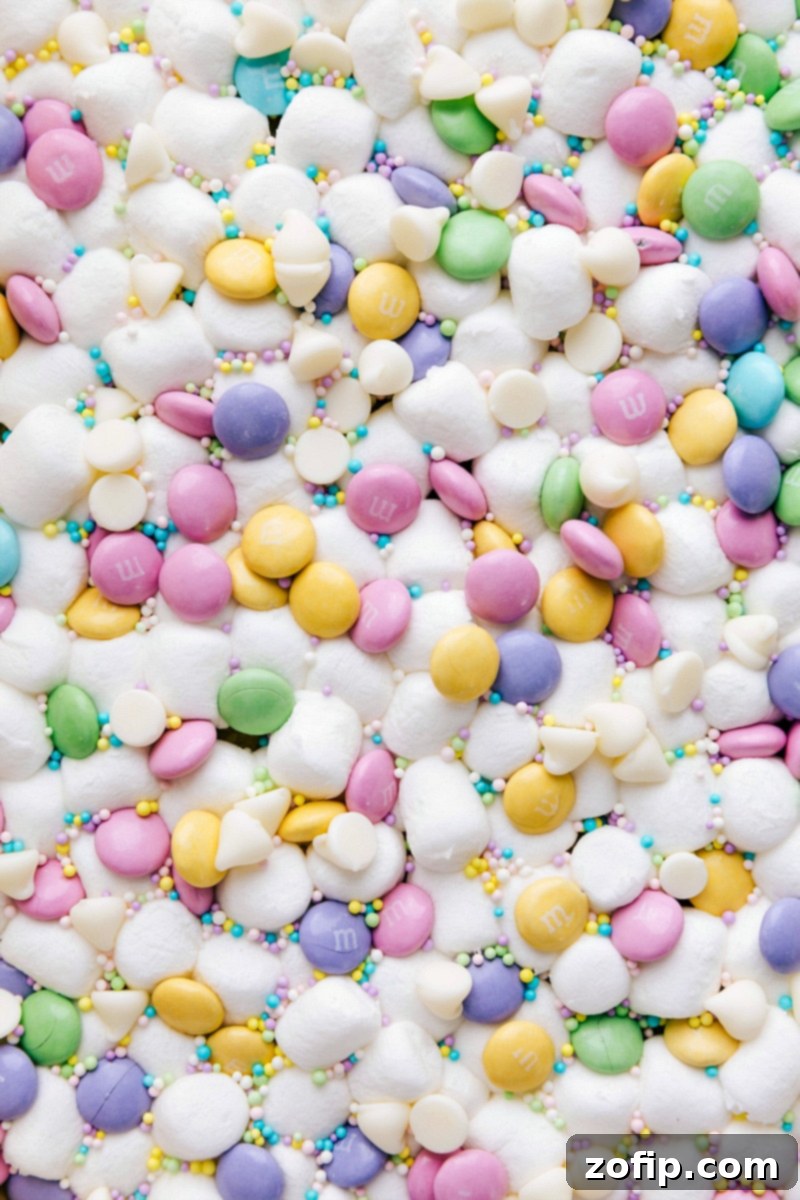 A freshly baked confetti cake bar, warm and inviting, just removed from the oven, showcasing its golden edges and colorful topping.