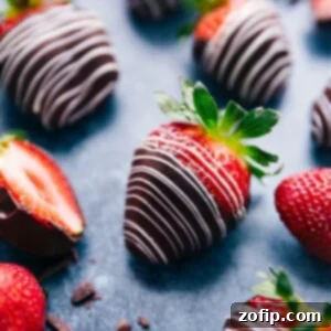 A plate of perfectly crafted chocolate covered strawberries, ready to be enjoyed.