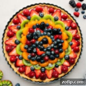 Ultimate Fruit Pizza Dessert 3 Final Fruit Pizza recipe with a sweet glaze—slice and enjoy!