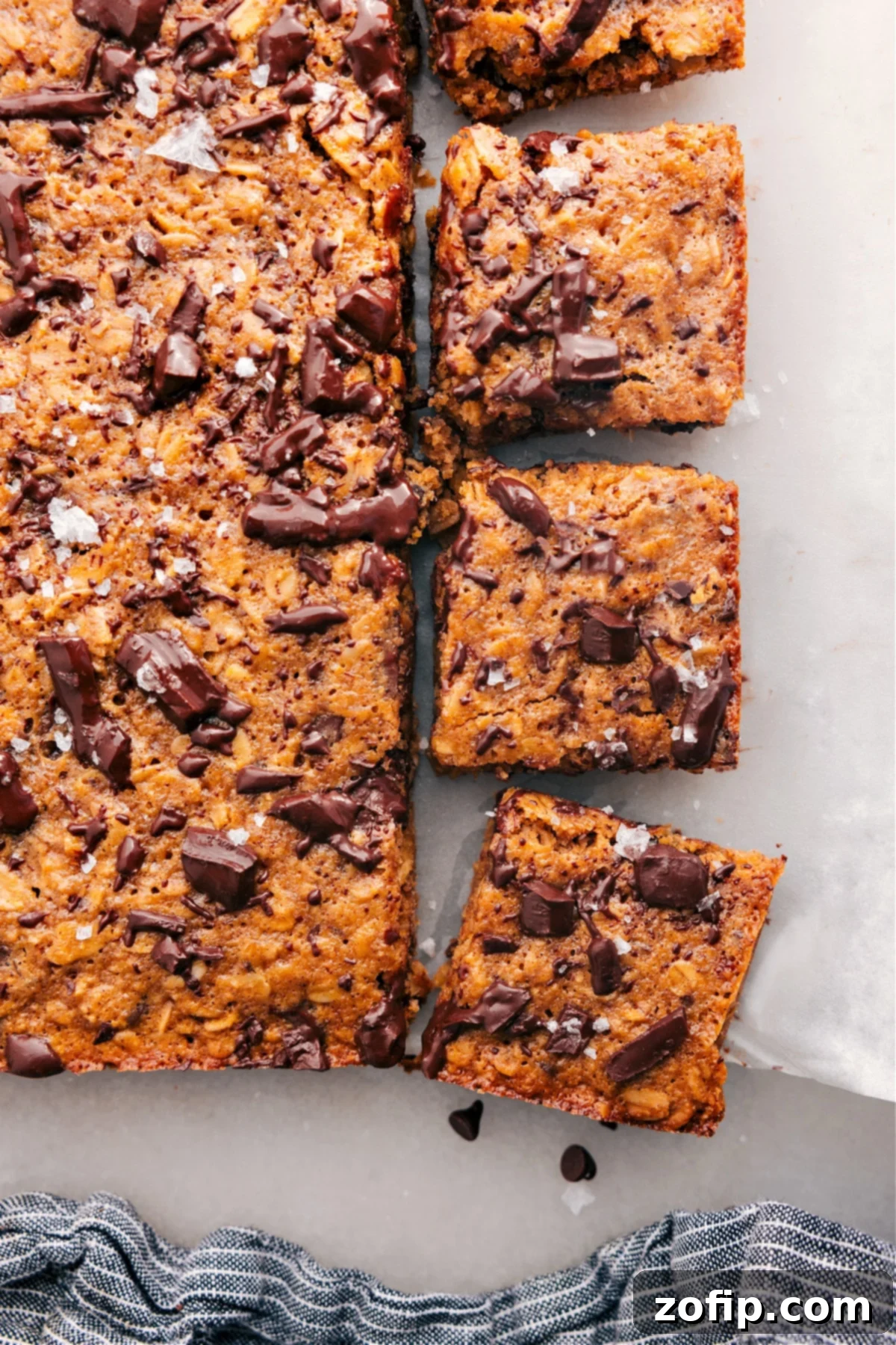 Perfectly Baked Oatmeal Bars For Any Time A freshly baked batch of Soft-Baked Oatmeal Breakfast Bars, perfectly golden brown and ready to be enjoyed as a wholesome snack or breakfast.