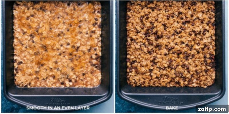 A baking pan lined with parchment paper, ready for the oatmeal batter.