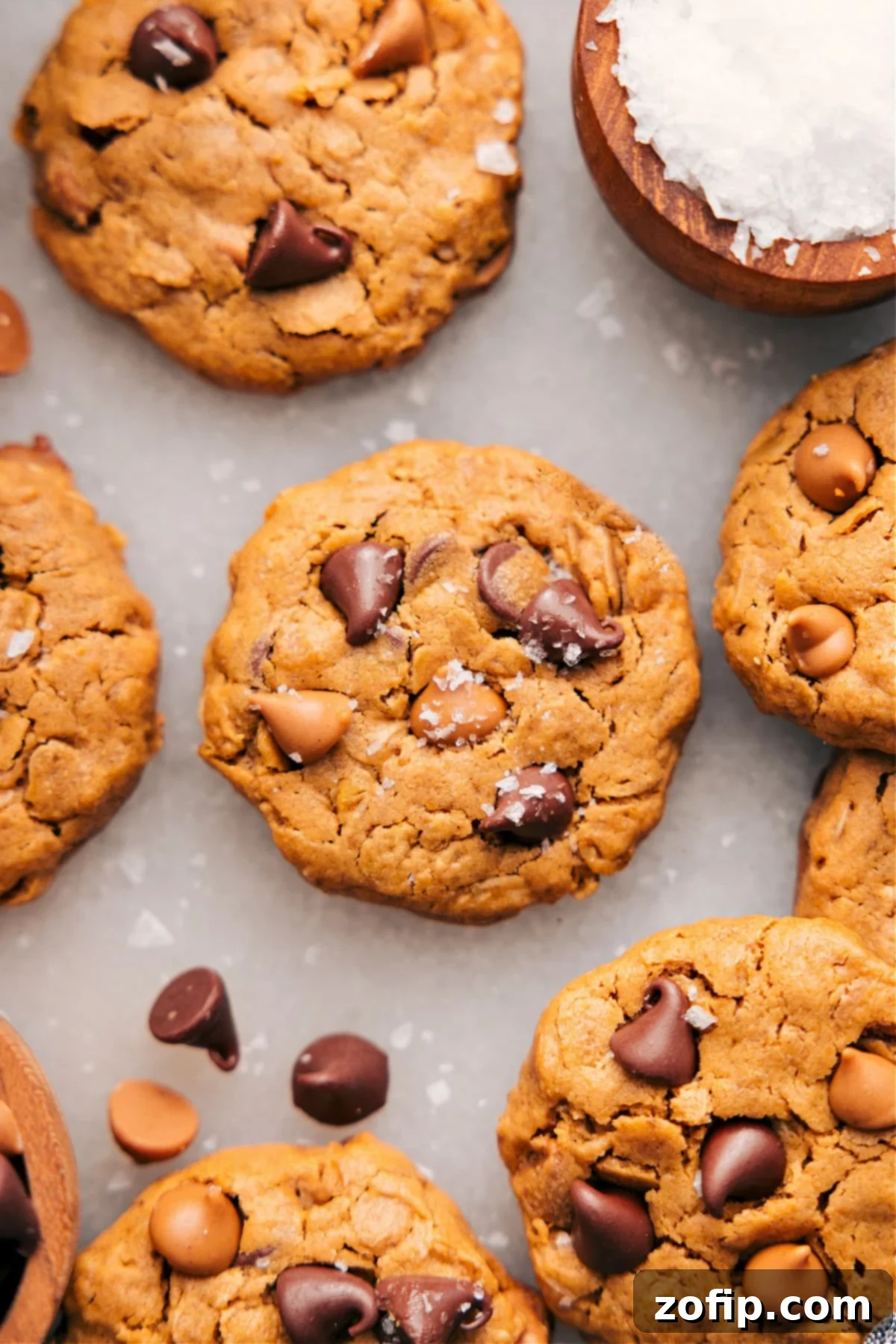 Gluten-Free Healthy Peanut Butter Oat Breakfast Cookies Soft and chewy Healthy Breakfast Cookies, freshly baked and sprinkled with sea salt, arranged invitingly on a cooling rack.