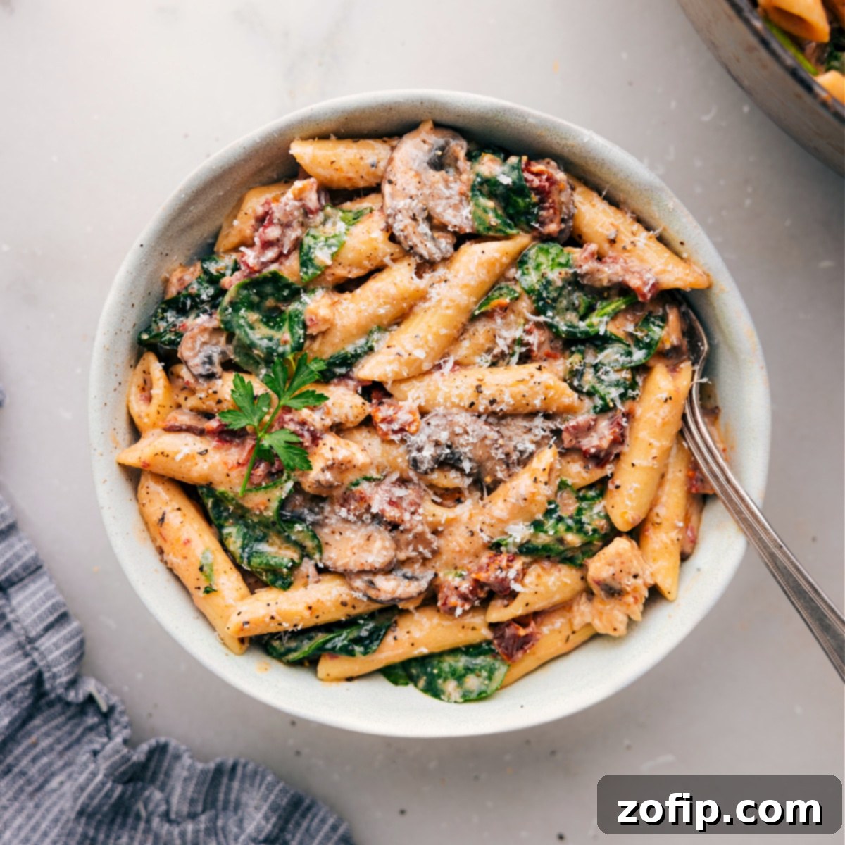 Savory Chicken Penne Pasta served in a bowl, ready to enjoy A bowl of delicious Chicken Penne Pasta, perfectly cooked and served warm.