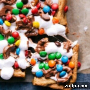 Birthday Cake Blondies 3 Funfetti bars with a piece cut out, beckoning to be savored.