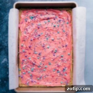 Frosted Sugar Cookie Bars 2 Sugar Cookie Bars topped with sprinkles
