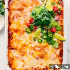 Delicious Chicken Enchilada Casserole with melted cheese on top