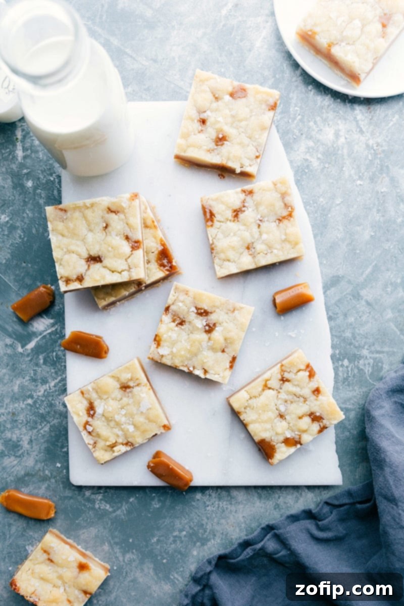 Warm Caramel Cookie Bars with Milk The finished dessert, warm and fresh from the oven, ready to eat with a glass of milk.