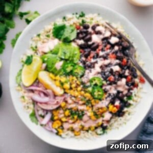 Black Bean Burrito Bowls with all components layered beautifully.