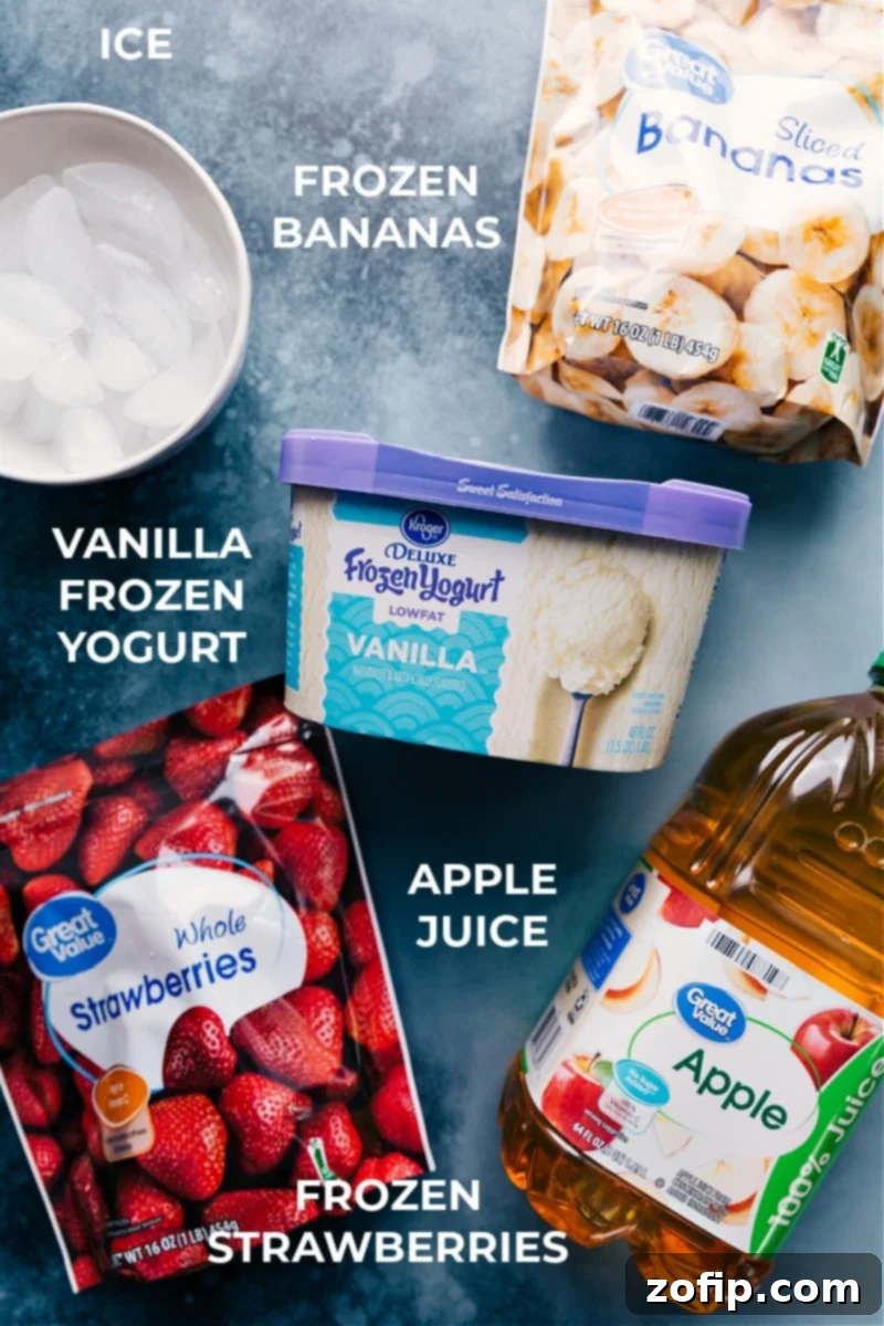 Jamba Juice® Strawberry Wild is made with apple juice, frozen fruit, ice, and some frozen vanilla yogurt. Recipe via ChelseasMessyApron #breakfast #quick #easy #simple #best #healthy #dessert #ice #jambajuice #strawberry #wild #smoothie Ingredients in the Jamba Juice Strawberry Wild smoothie, laid out on a surface