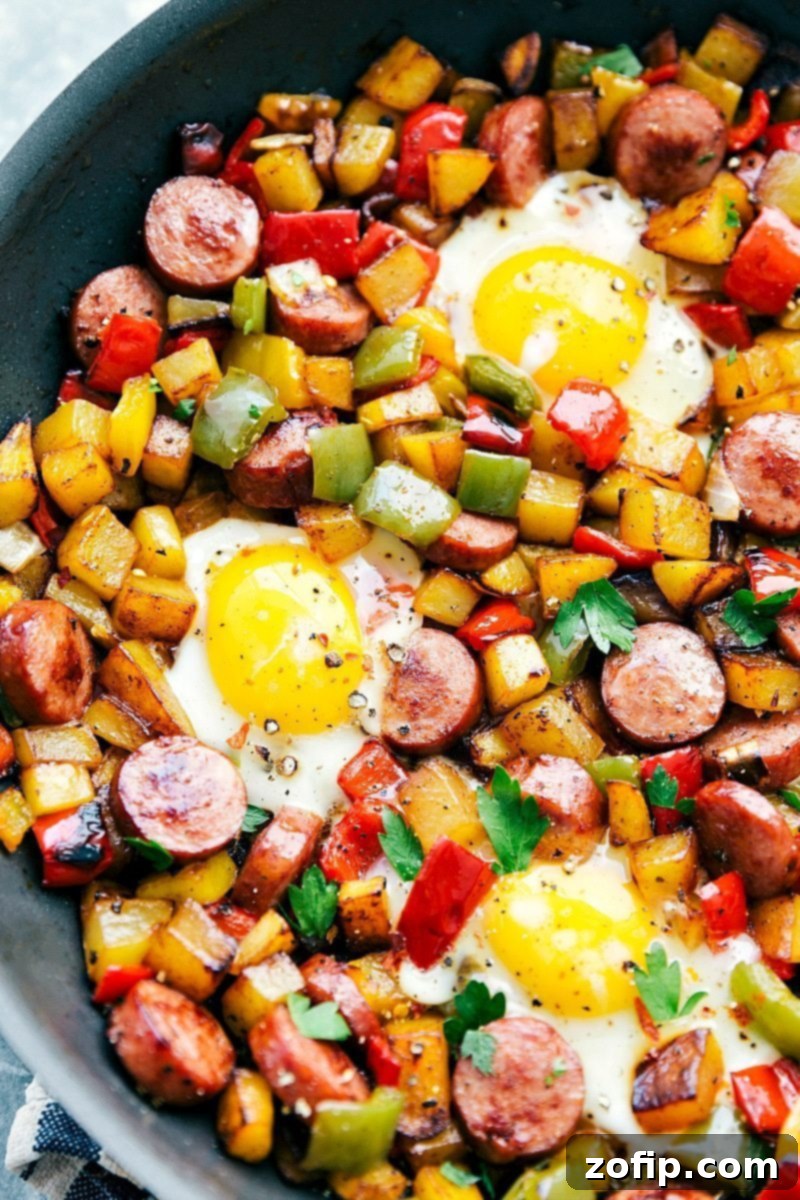 Sheet Pan Sausage and Roasted Vegetables 6 A vibrant close-up of the finished smoked sausage and veggie hash, ready to be served.
