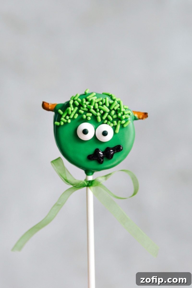 FRANKENSTEIN OREO POPS! Simple Oreo Pops decorated for Halloween -- Spider Oreo Pops, Skeleton Oreo Pops, Frankenstein Oreo Pops, and Monster Oreo Pops are a fun activity. via chelseasmessyapron.com