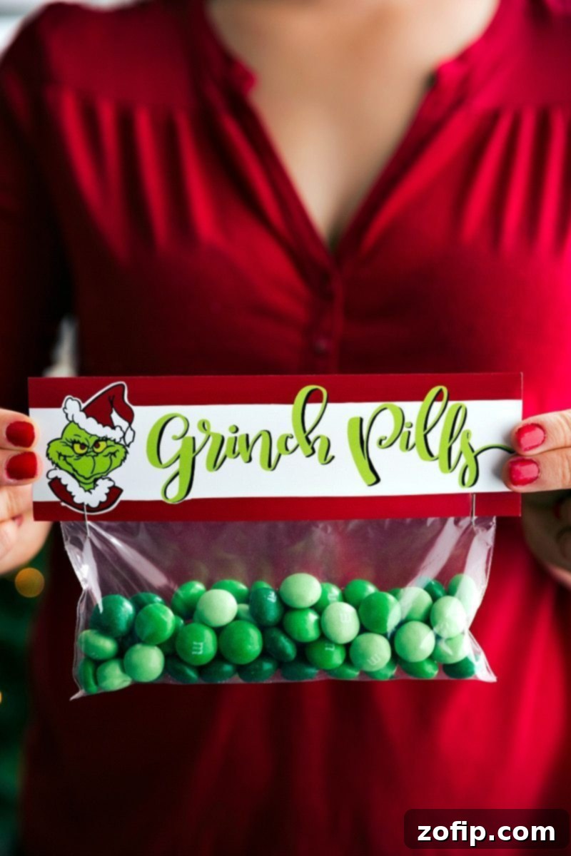 Grinch Pills: A humorous Christmas gift of green Mint M&M's with a playful printable topper to cure holiday grumpiness.