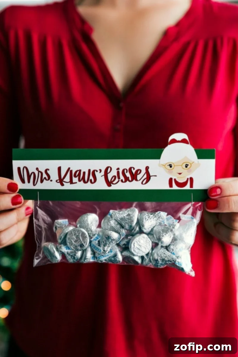 Mrs. Klaus' Kisses: Classic Hershey's Kisses in a snack bag with a cute printable, a simple and sweet Christmas gift.