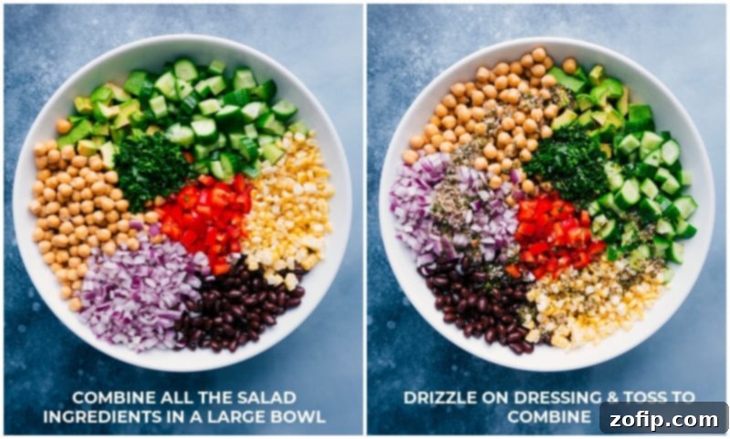 Ingredient shot showing all the fresh vegetables in a bowl with dressing being poured over the Garbanzo Bean Salad.