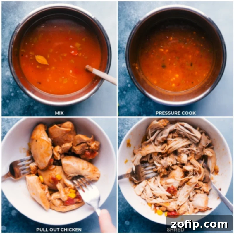 Close-up process shot of tender, cooked chicken being carefully pulled out of the Instant Pot and shredded using two forks, showcasing its perfect, fall-apart texture for the soup.