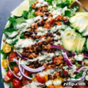 Vibrant and colorful turkey taco salad, fully dressed and ready to serve.
