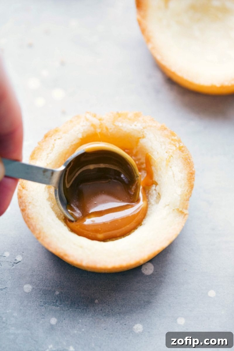Overhead view of several Sugar Cookie Turtle Pudding Bites on a white platter, ready to be served