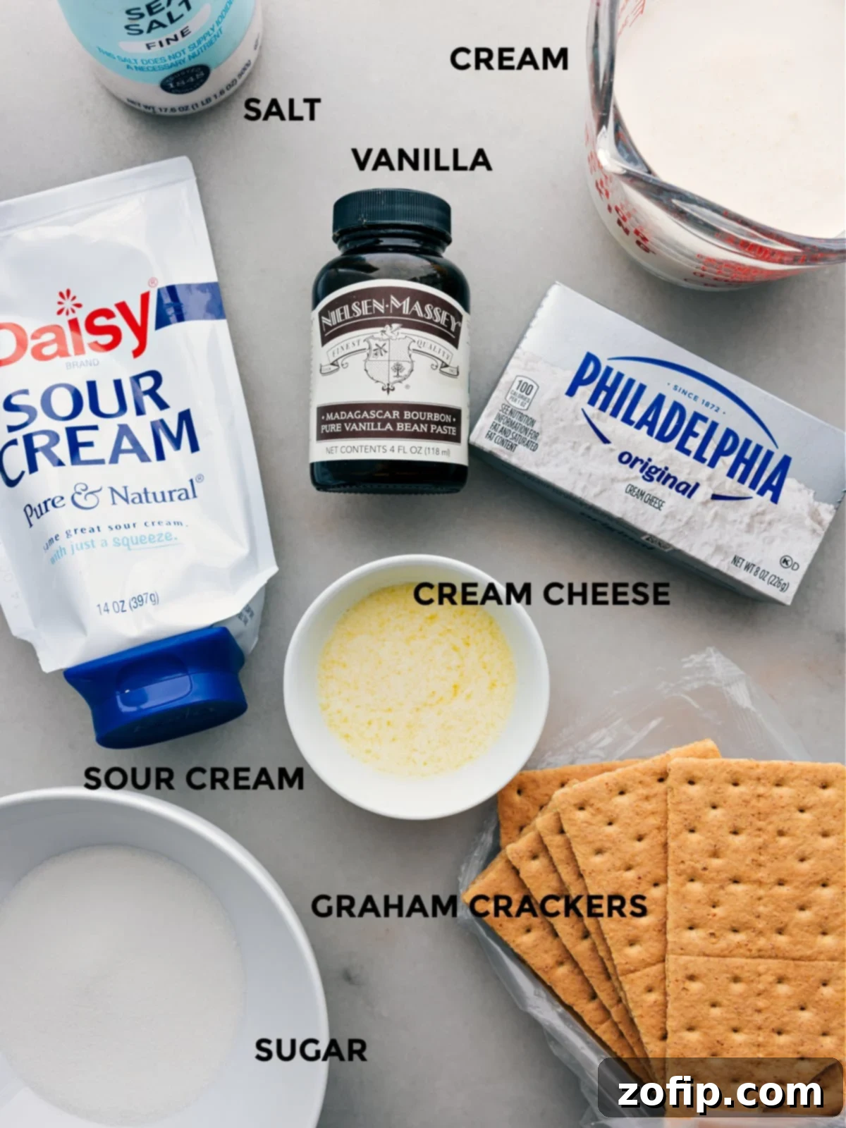 Close-up of a cheesecake in a jar, showcasing its smooth, creamy texture and a layer of graham cracker crust.